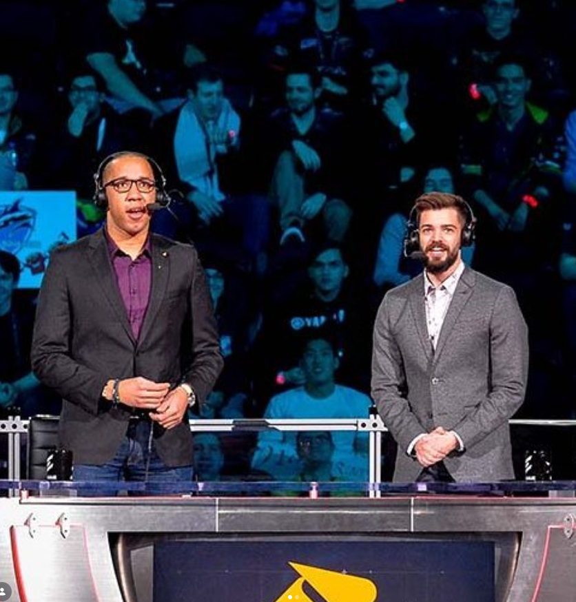 Daniel Kapadia commentating on stage with a co-caster at a Counter-Strike Major